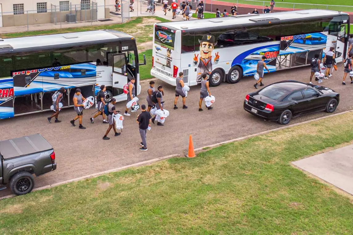 Group pf people getting into The Charter Bus